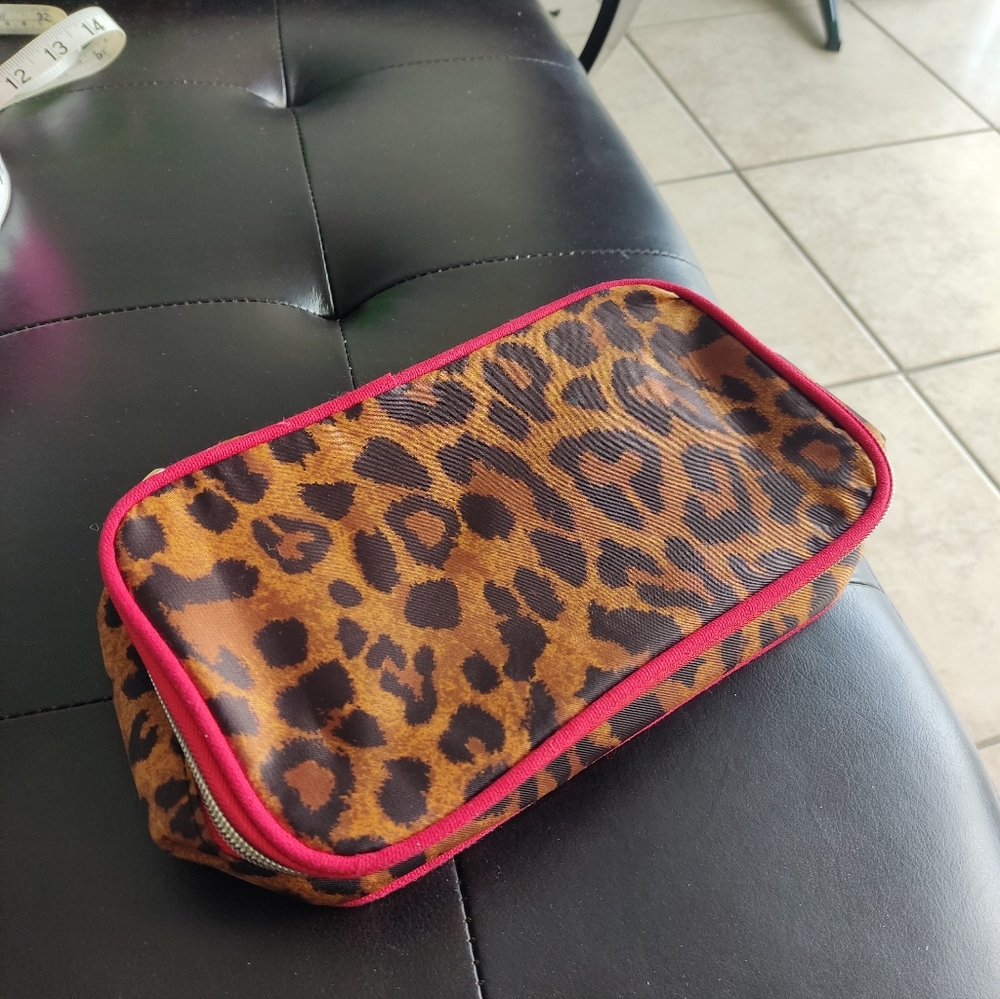 New Avon Leopard Print Cosmetic Bag with Red Trim